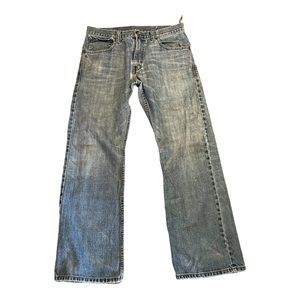 SilverTab distressed- blue jeans. Boot cut 33x32